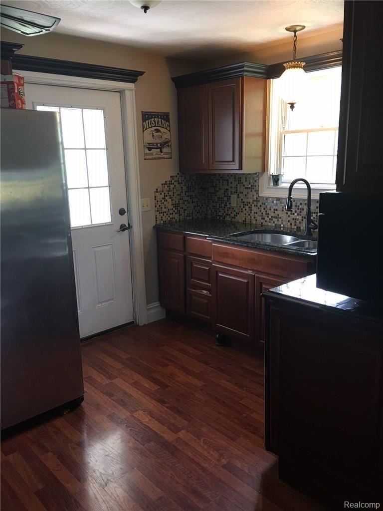 10495 Argentine Road Linden, MI 48451 - Photo 5 of 29 kitchen towards rear deck