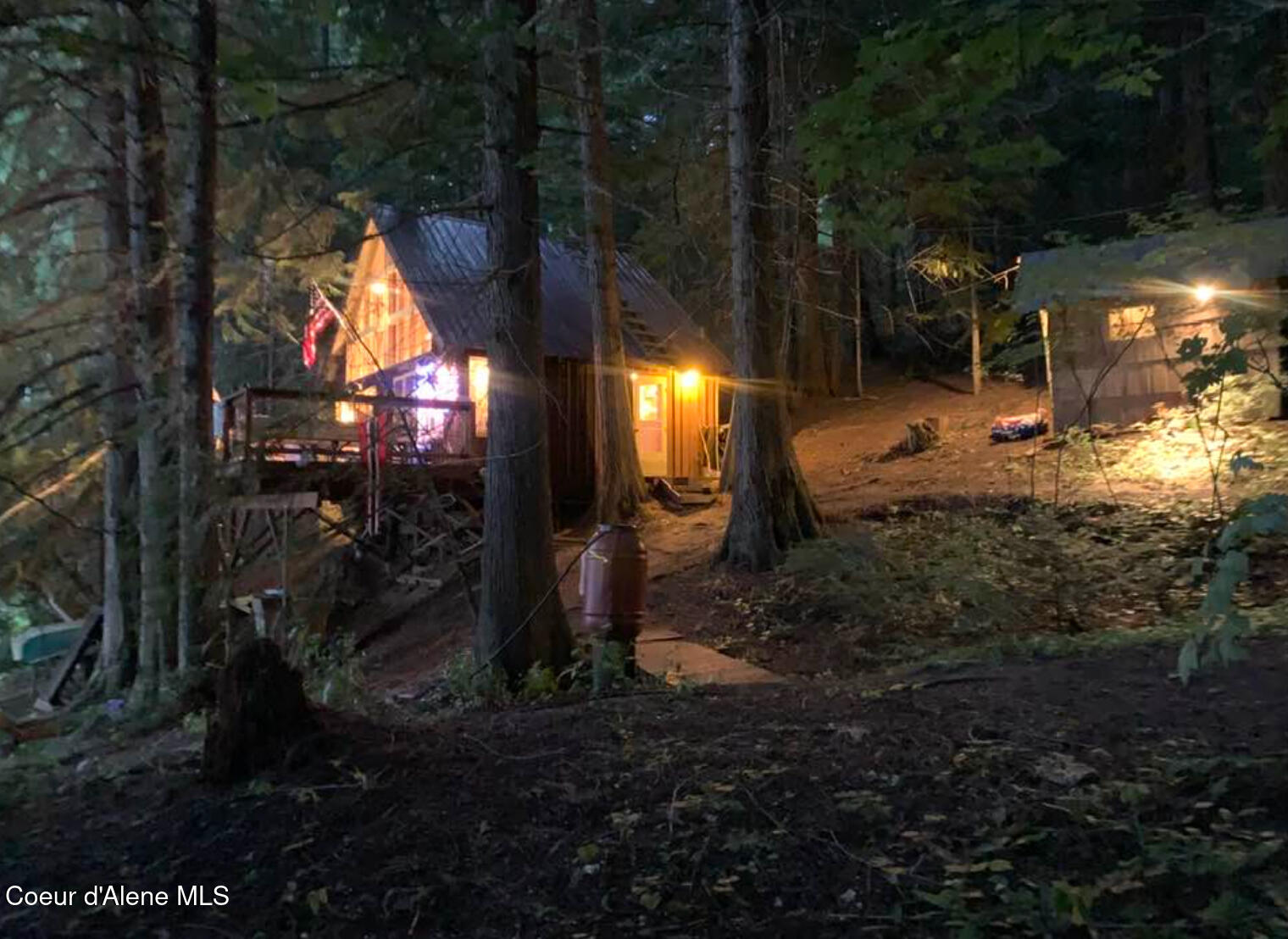 9598 South Upper Twin Lakes Shore Rathdrum, ID 83858 - Photo 33 of 34 Cabin evening