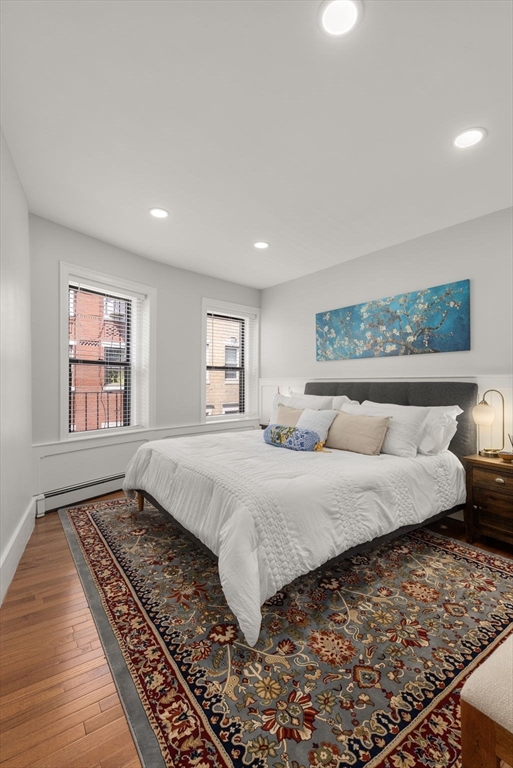 165 Salem Street, Unit 3 Boston, MA 02113 - Photo 15 of 16 a bedroom with a large bed and a window