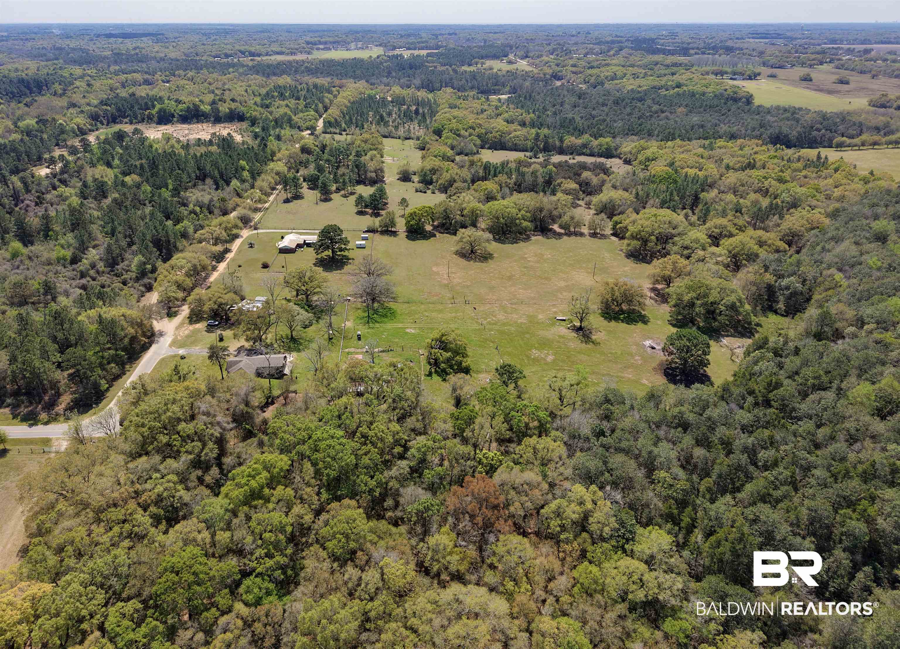 11100 Rhett McConnell Road Theodore, AL 36582 - Photo 32 of 47 Overview of rural landscape featuring a forest