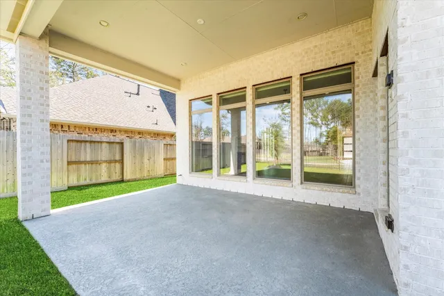 a view of an empty room with a sliding door