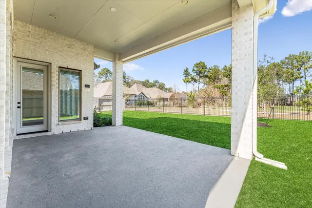 a view of a house with a big yard