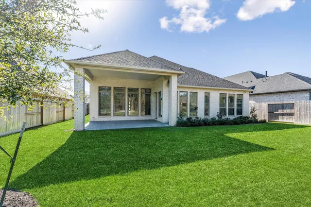 a view of a house with a garden