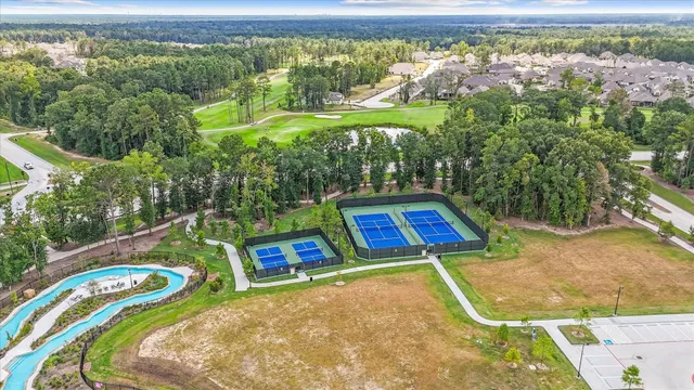 swimming pool view with a outdoor seating space