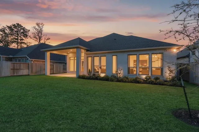 a view of a yard in front of a house