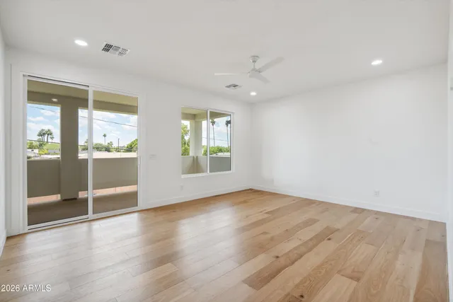 a bathroom with 2 sink tub and a mirror