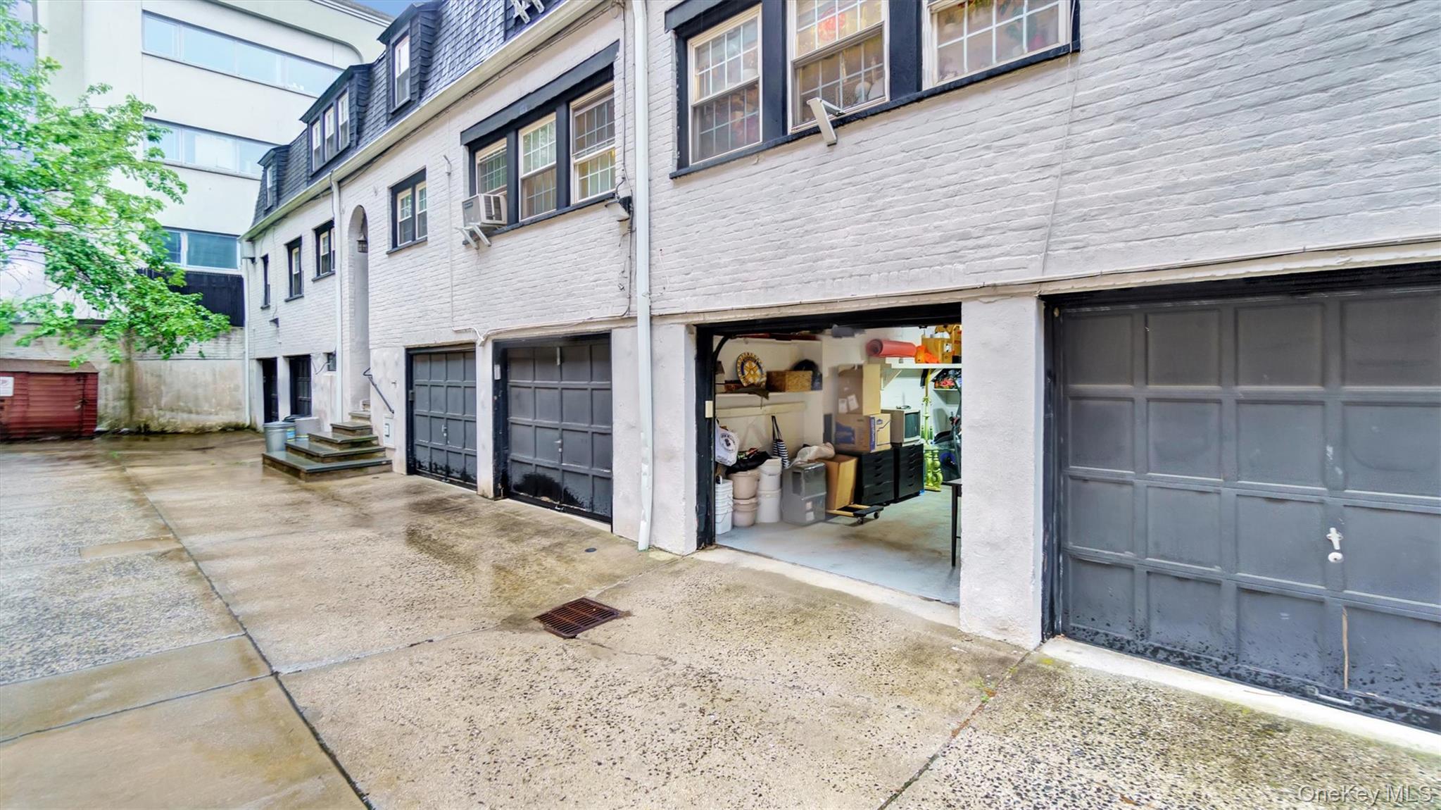 19 Barstow Road, Unit G Great Neck, NY 11021 - Photo 11 of 36 a view of a building with the door