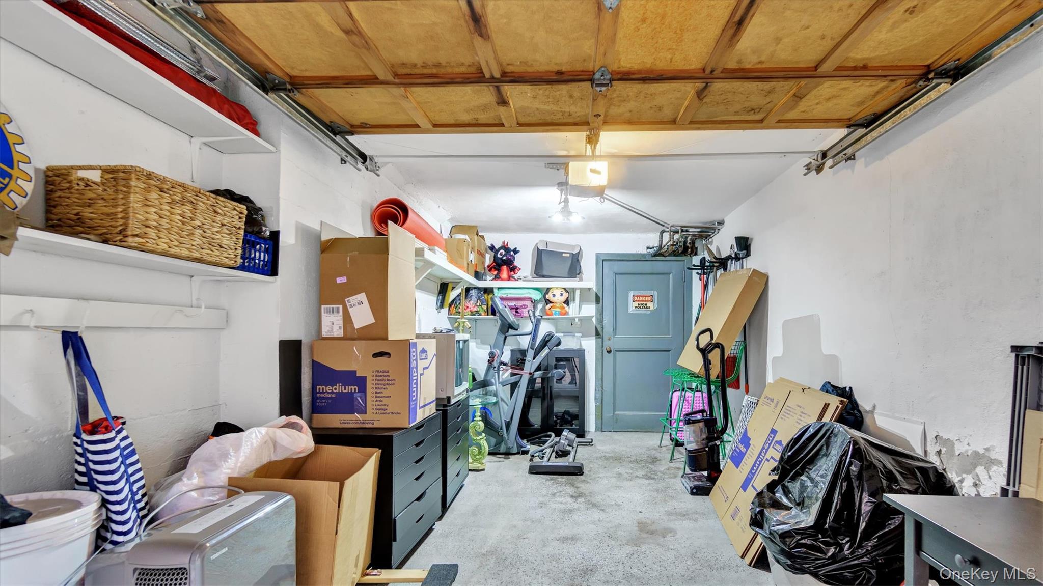 19 Barstow Road, Unit G Great Neck, NY 11021 - Photo 12 of 36 a view of a room with gym equipment