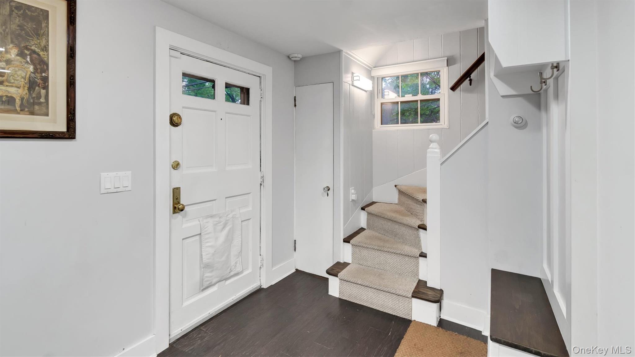 19 Barstow Road, Unit G Great Neck, NY 11021 - Photo 18 of 36 a view of entryway with furniture and stairs