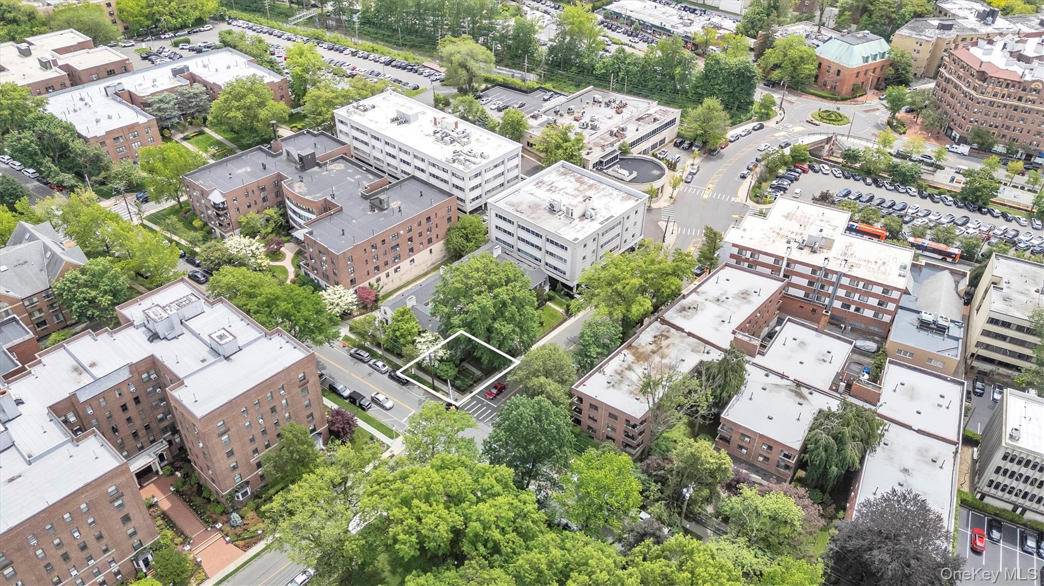 19 Barstow Road, Unit G Great Neck, NY 11021 - Photo 3 of 36 an aerial view of residential house with outdoor space