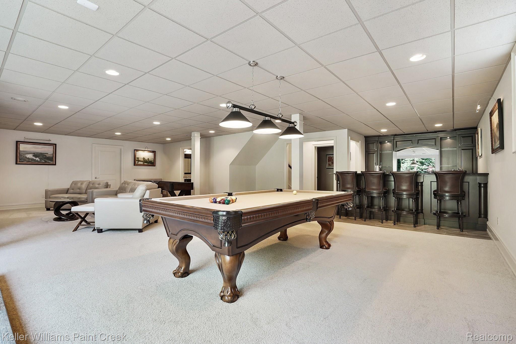 2772 North Addison Circle Rochester, MI 48306 - Photo 60 of 71 Beautiful custom bar is the perfect finishing touch to this amazing space