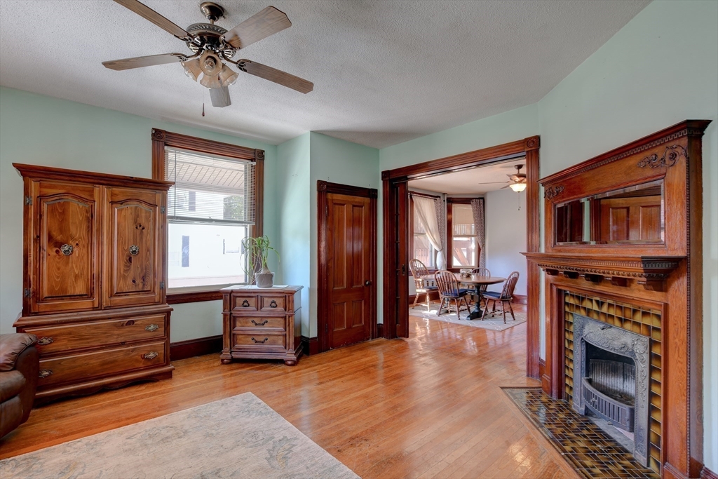 120 Graham Street Gardner, MA 01440 - Photo 14 of 37 a living room with furniture and a fireplace