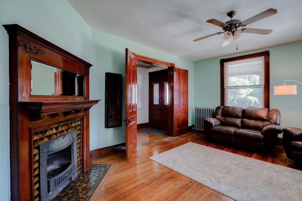 120 Graham Street Gardner, MA 01440 - Photo 16 of 37 a living room with furniture and a fireplace