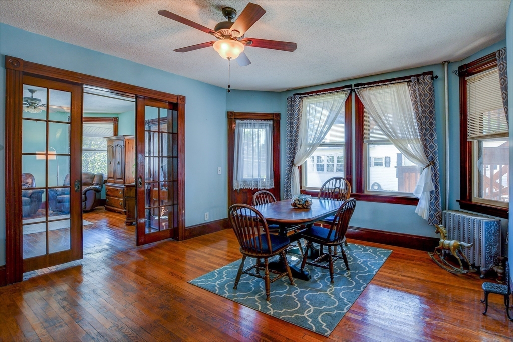 120 Graham Street Gardner, MA 01440 - Photo 18 of 37 a dining room with furniture a chandelier and wooden floor
