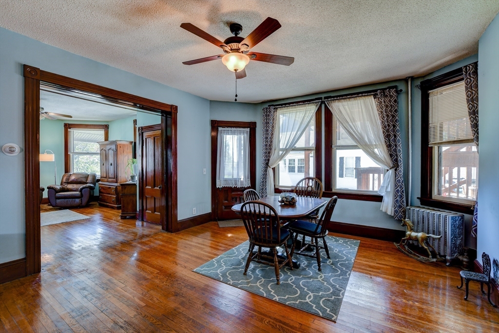120 Graham Street Gardner, MA 01440 - Photo 20 of 37 a view of a dining room with furniture window and wooden floor