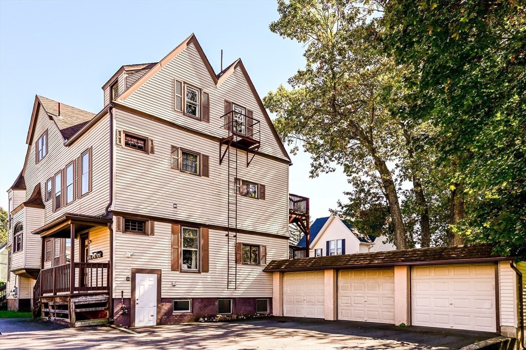 120 Graham Street Gardner, MA 01440 - Photo 3 of 37 a front view of a house with a yard