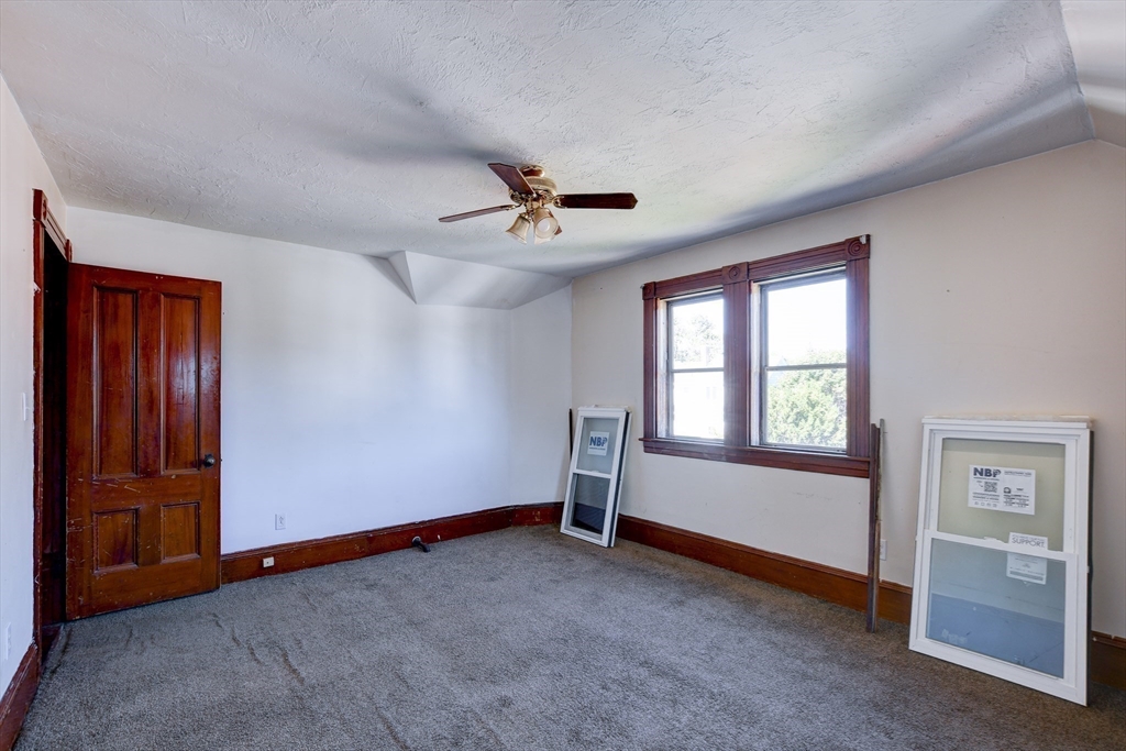 120 Graham Street Gardner, MA 01440 - Photo 33 of 37 an empty room with windows and closet
