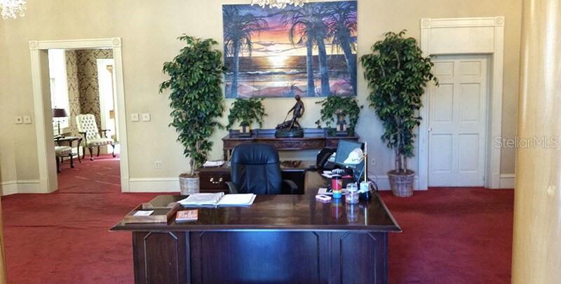 250 East Park Avenue Lake Wales, FL 33853 - Photo 7 of 15 a living room with furniture and a fireplace