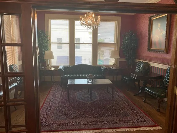 a living room with furniture and a window