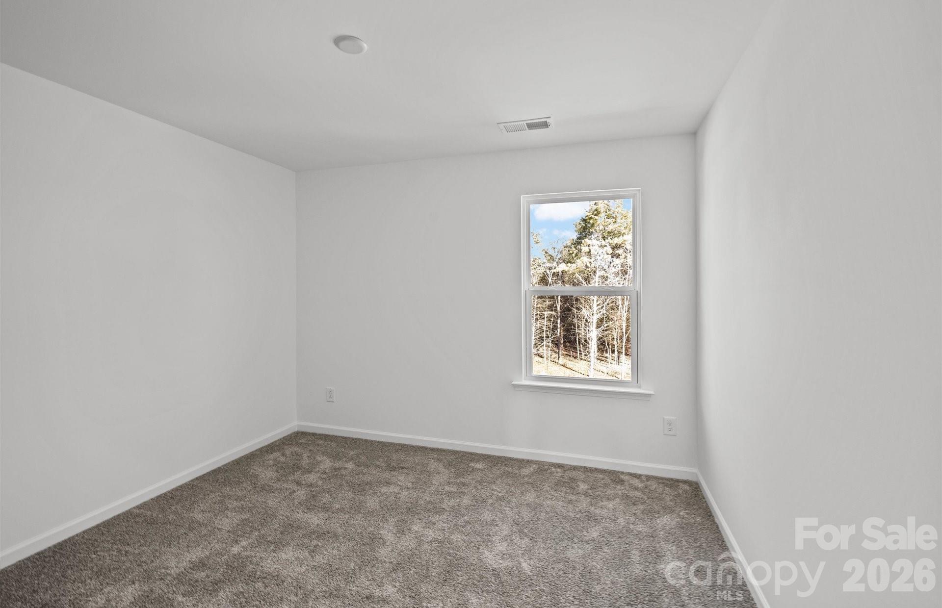 3605 Edisto Place Monroe, NC 28110 - Photo 14 of 17 an empty room with a window