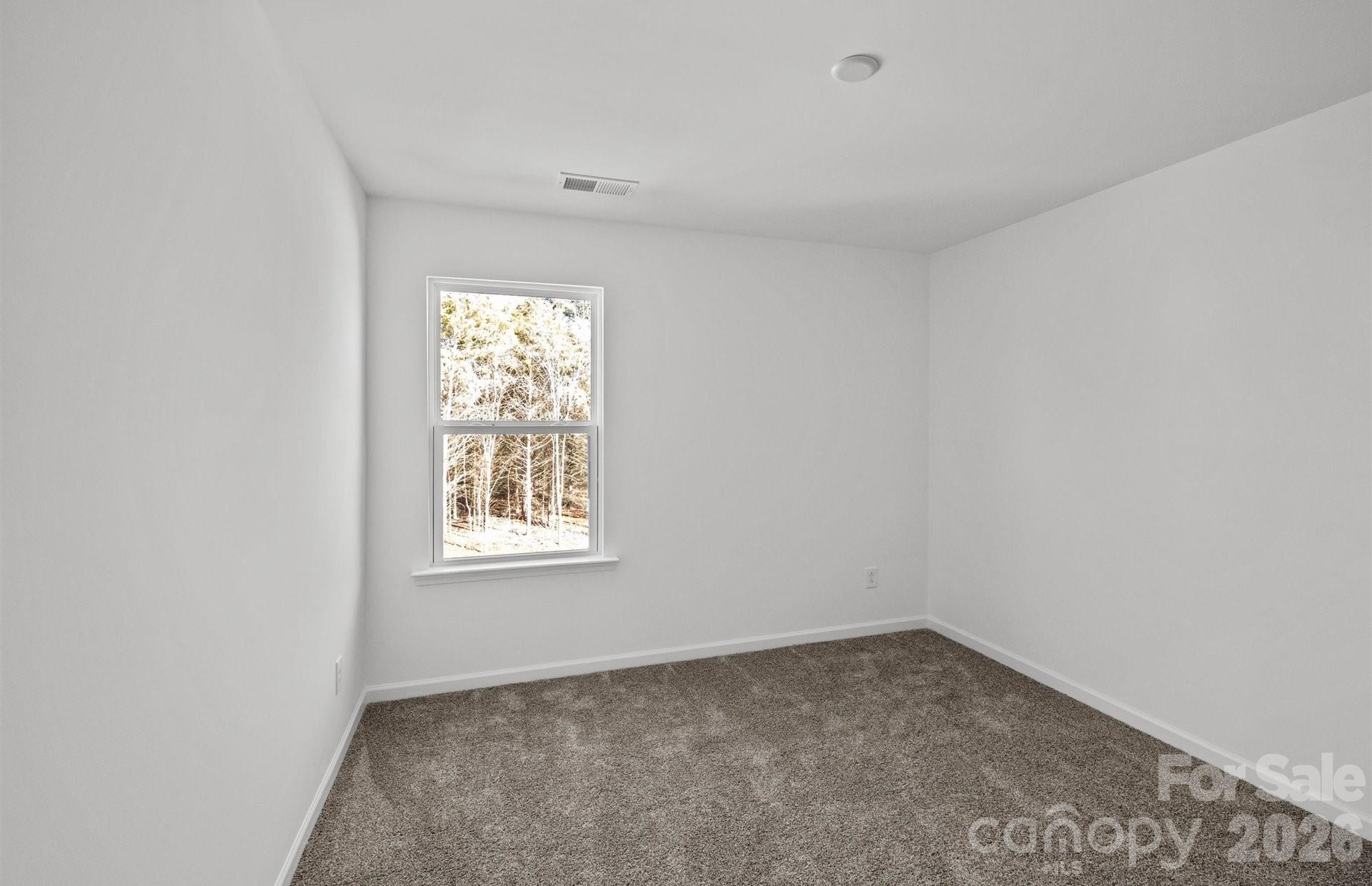 3605 Edisto Place Monroe, NC 28110 - Photo 16 of 17 an empty room with a window