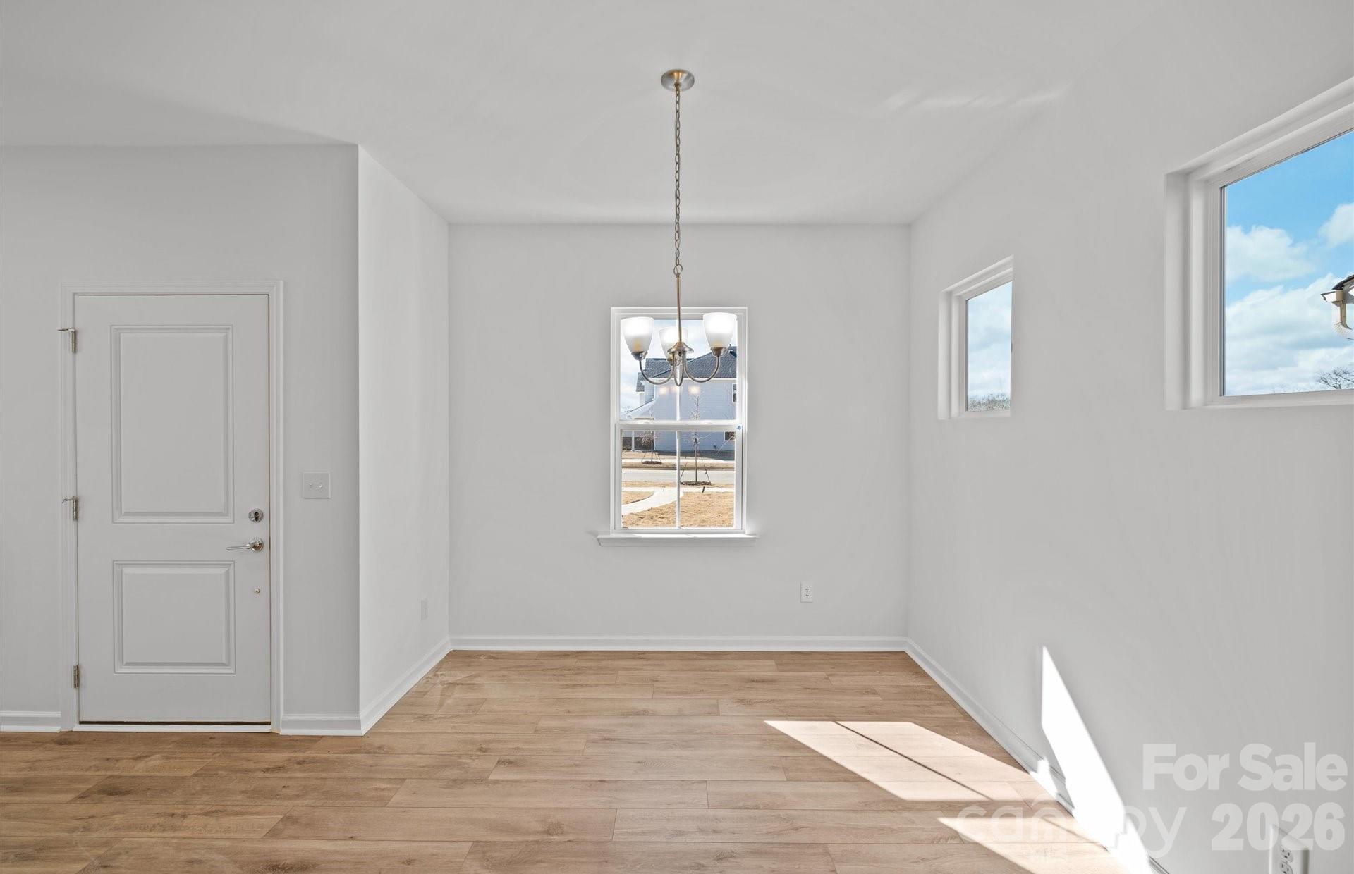 3605 Edisto Place Monroe, NC 28110 - Photo 5 of 17 a view of an empty room and window