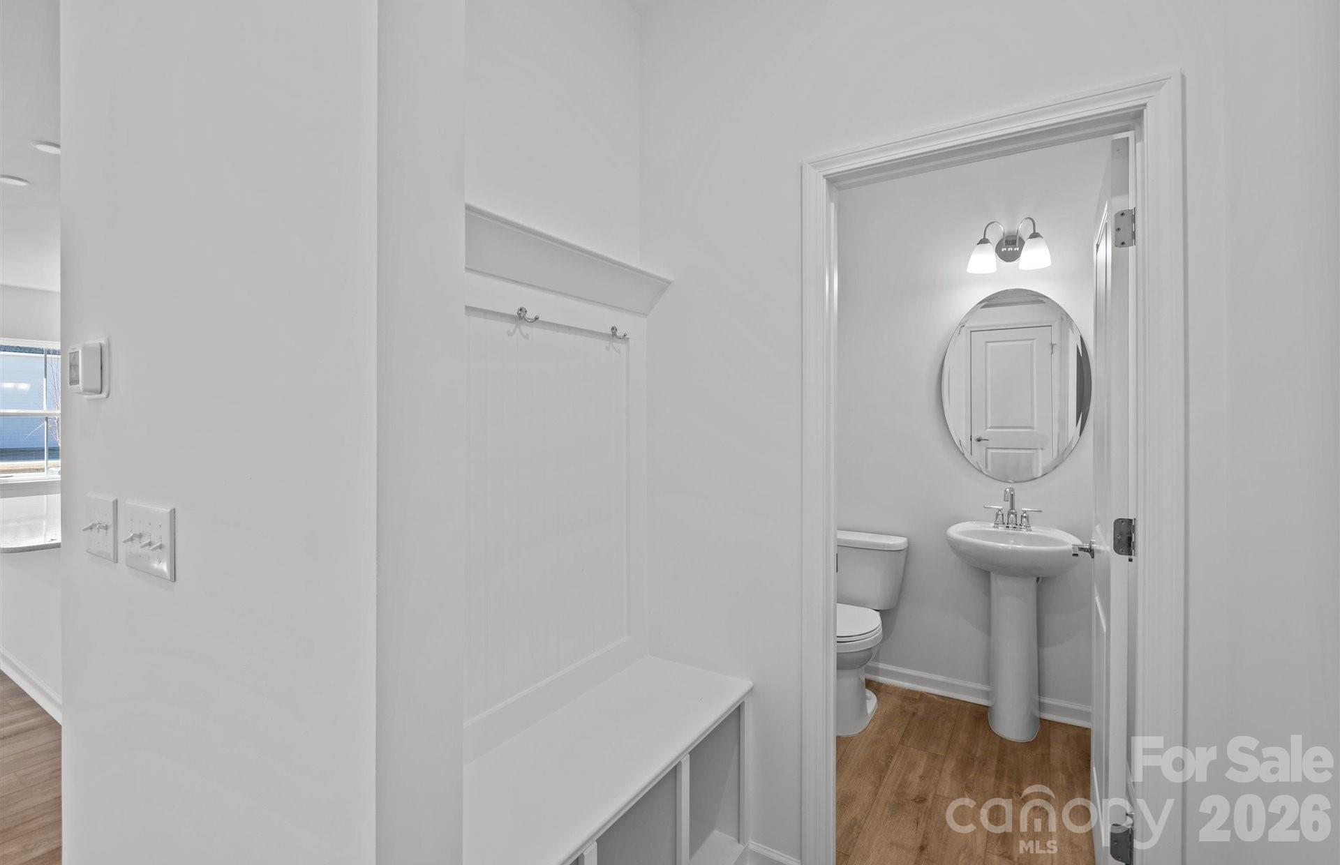 3605 Edisto Place Monroe, NC 28110 - Photo 6 of 17 a bathroom with a toilet and a sink