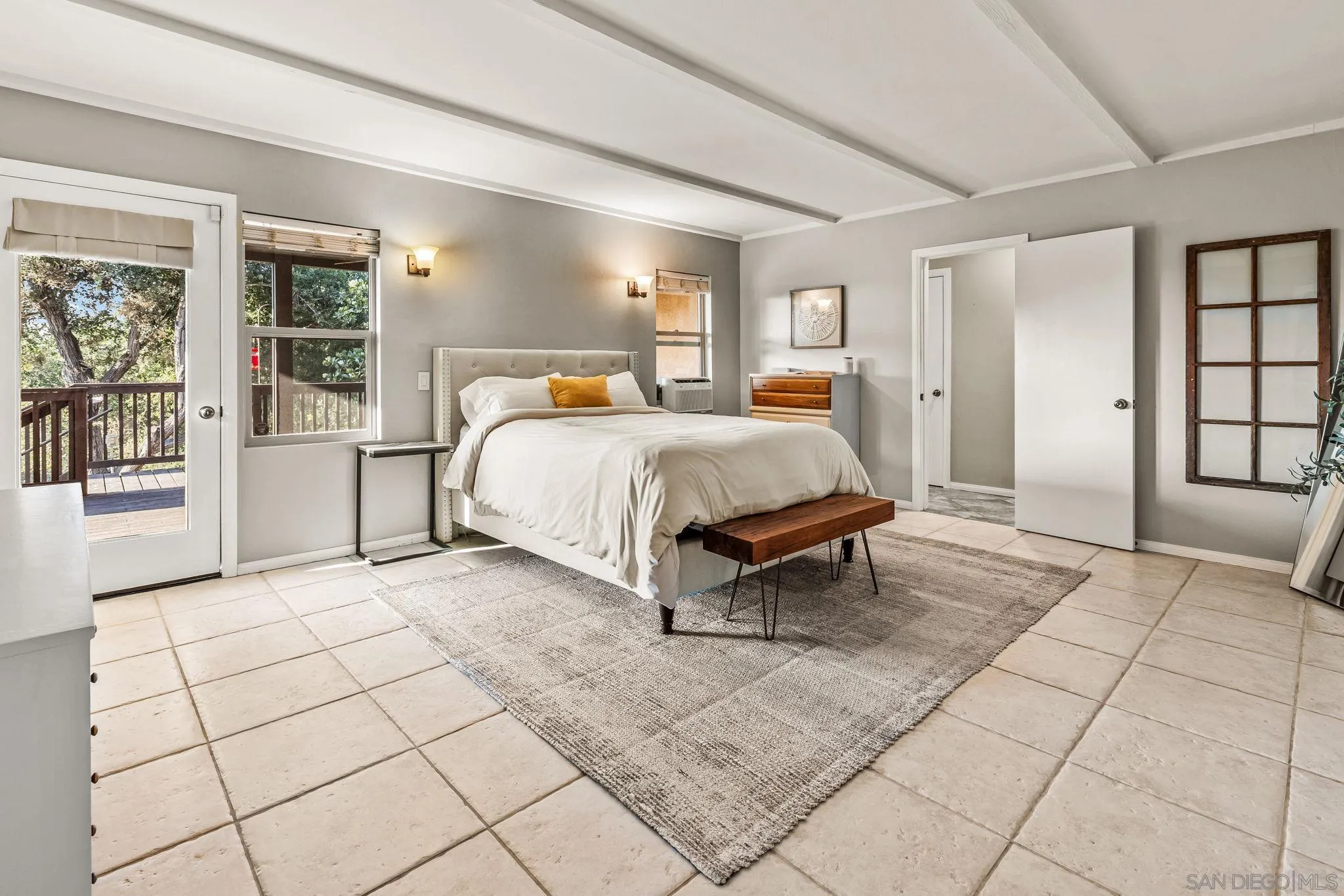 2260 East Mission Road Fallbrook, CA 92028 - Photo 18 of 38 a bed room with a bed and next to a window