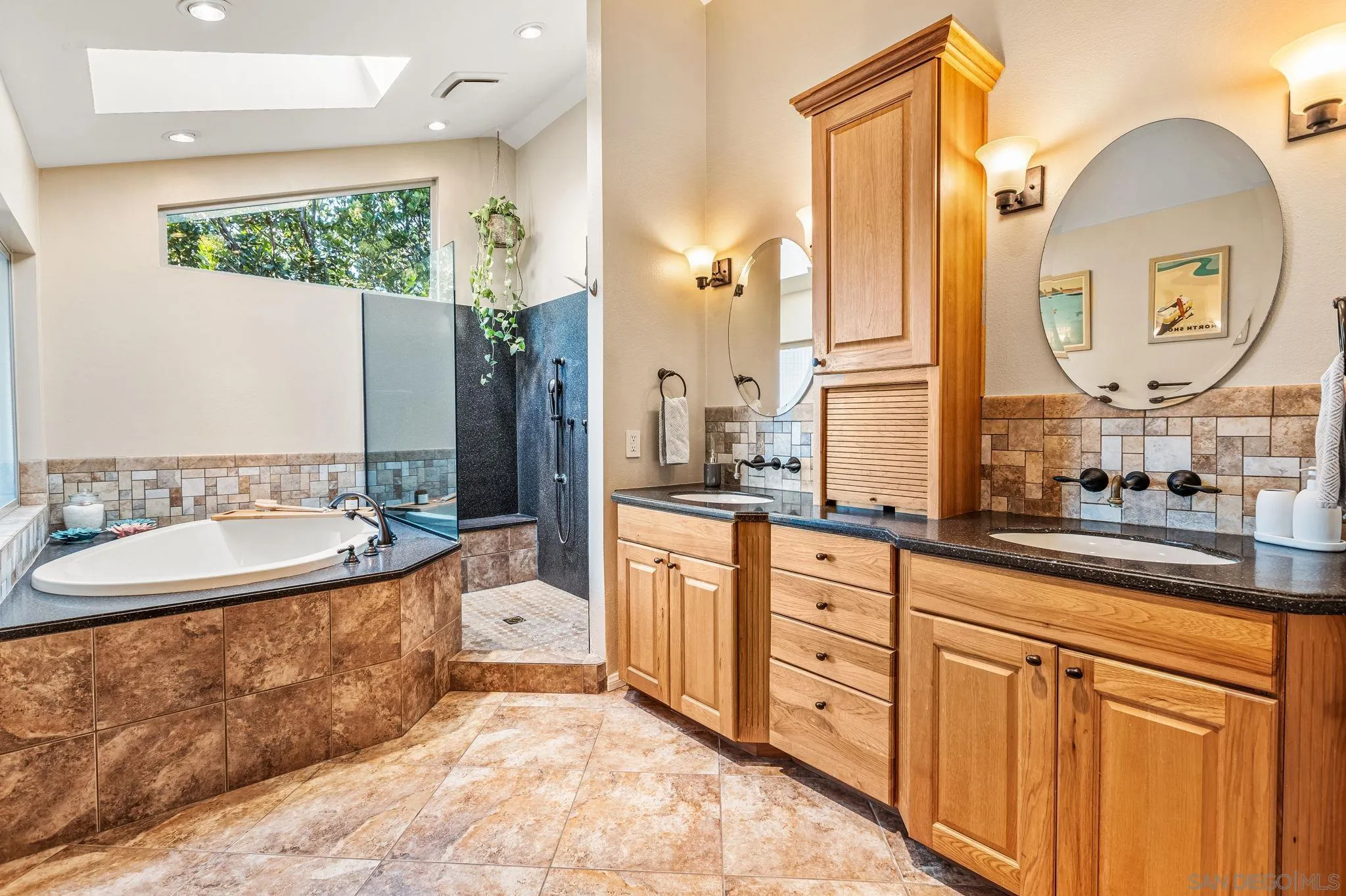 2260 East Mission Road Fallbrook, CA 92028 - Photo 20 of 38 a spacious bathroom with a double vanity sink and a mirror