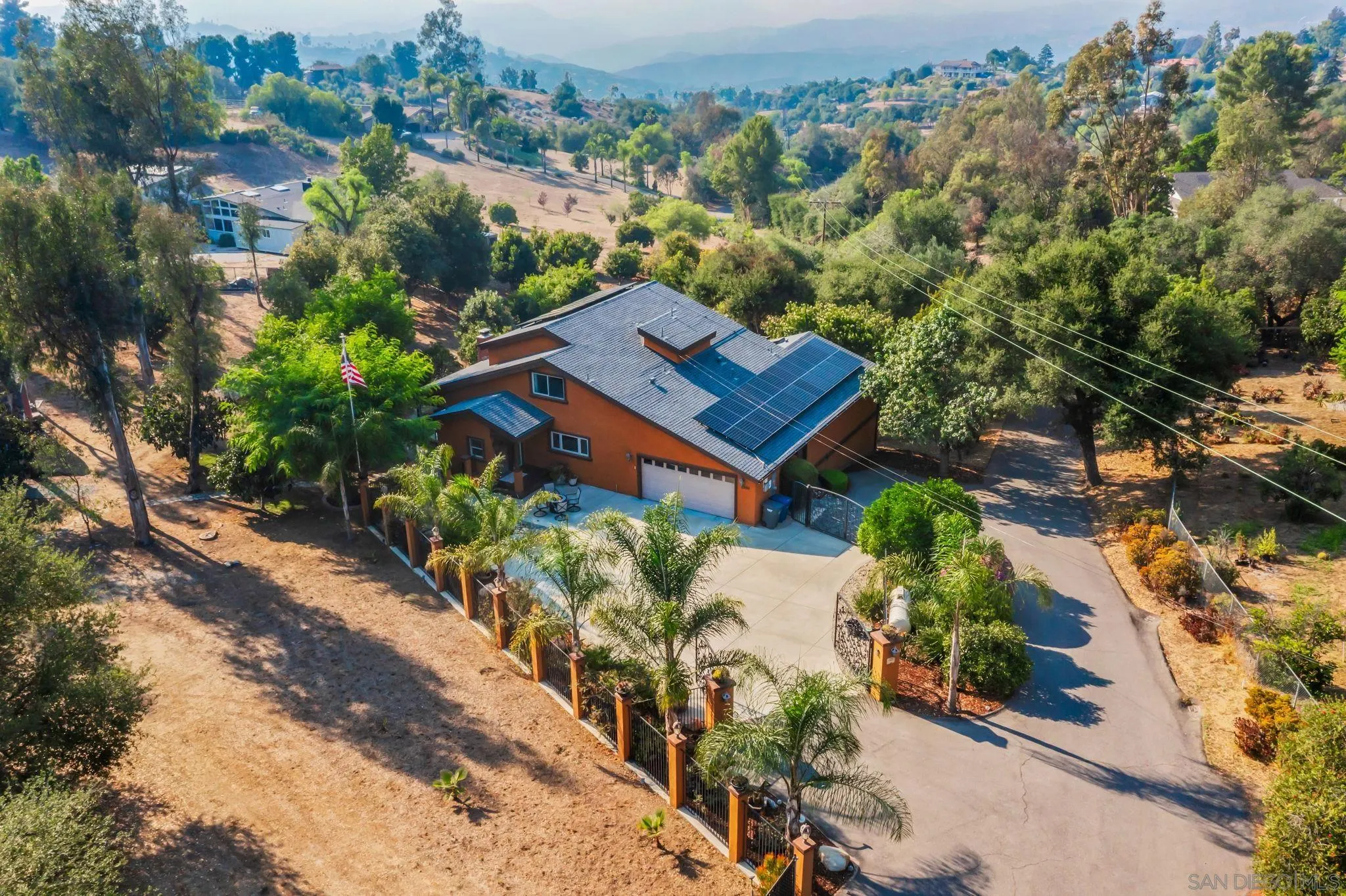 2260 East Mission Road Fallbrook, CA 92028 - Photo 26 of 38 an aerial view of a house with a yard