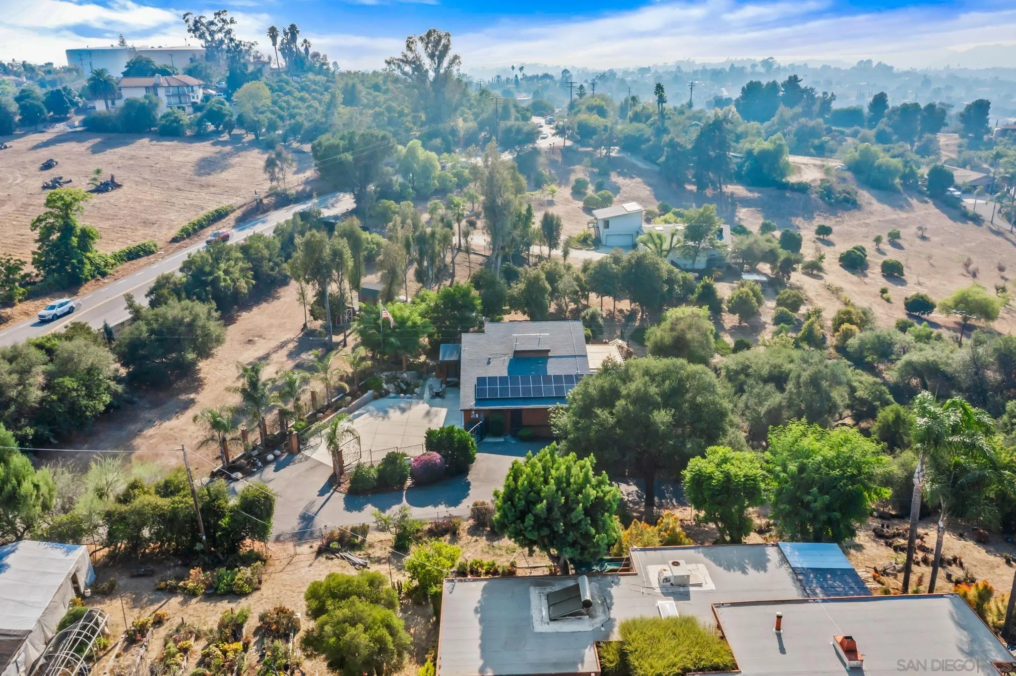 2260 East Mission Road Fallbrook, CA 92028 - Photo 28 of 38 an aerial view of a city with lots of residential buildings