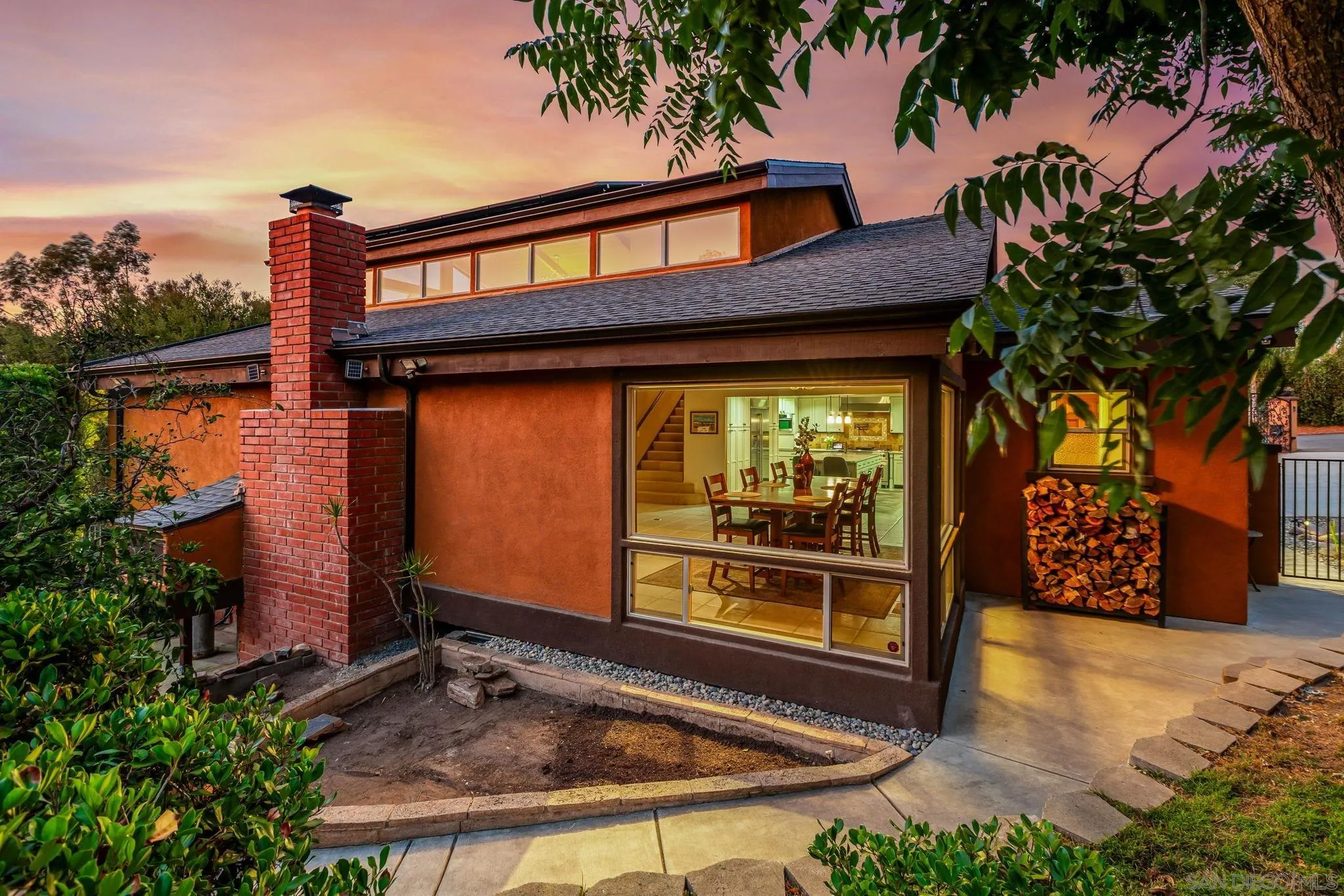 2260 East Mission Road Fallbrook, CA 92028 - Photo 33 of 38 a front view of a house with a garden