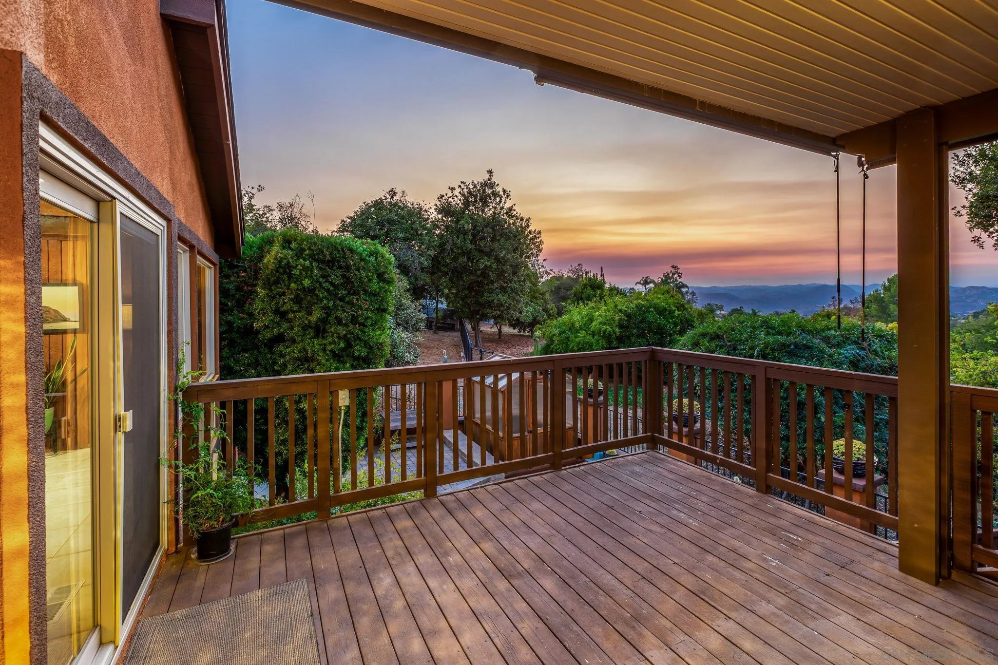 2260 East Mission Road Fallbrook, CA 92028 - Photo 35 of 38 a view of balcony with wooden floor and fence