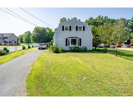 17 Babb Road Southwick, MA 01077 - Photo 1 of 20 a front view of a house with a yard