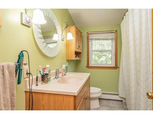 17 Babb Road Southwick, MA 01077 - Photo 10 of 20 a bathroom with a sink mirror toilet and bathtub