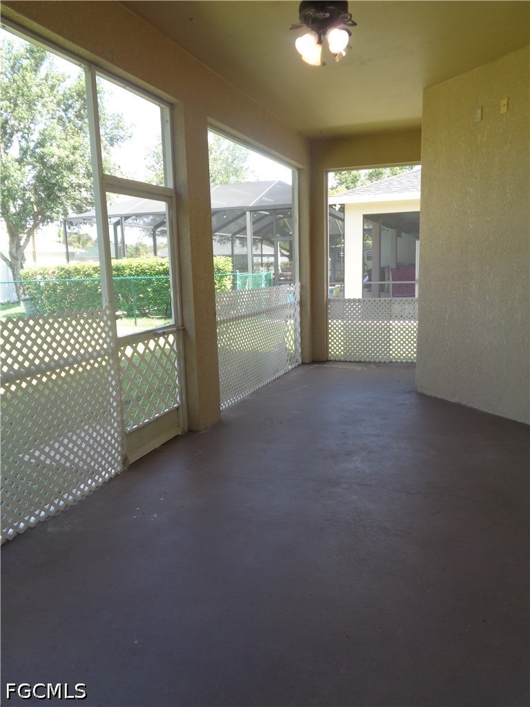 2463 Nature Pointe Loop Fort Myers, FL 33905 - Photo 42 of 50 a view of a room with sliding glass door and mountain view