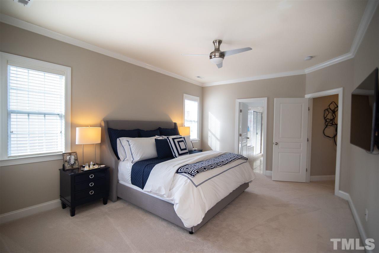 9311 Tabriz Point Raleigh, NC 27614 - Photo 12 of 25 Escape to your spacious master bedroom suite!