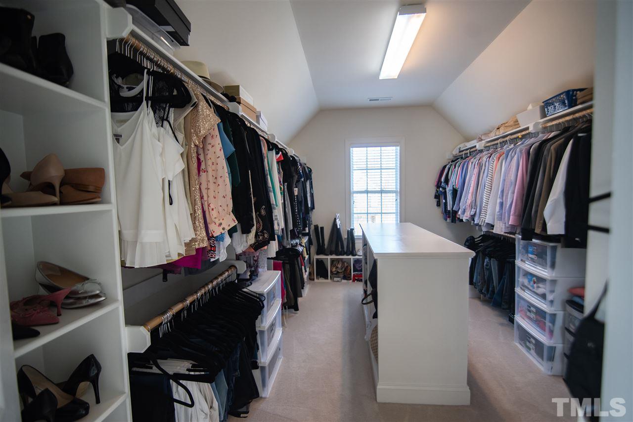 9311 Tabriz Point Raleigh, NC 27614 - Photo 16 of 25 This grand walk-in closet will keep all of your clothing organized and pristine.