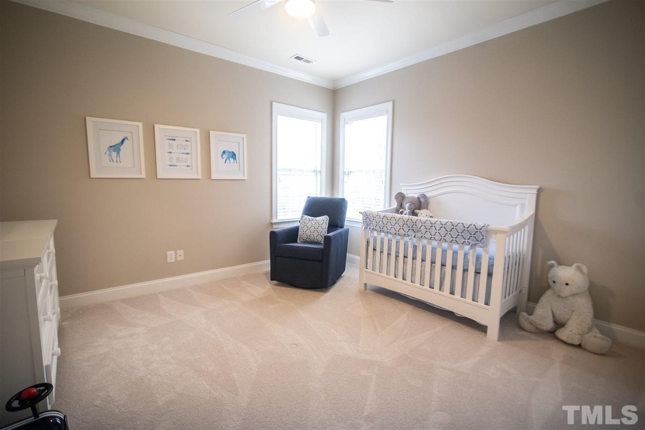 9311 Tabriz Point Raleigh, NC 27614 - Photo 17 of 25 Soothing neutral paint tones and plush carpet make this bedroom a dream!