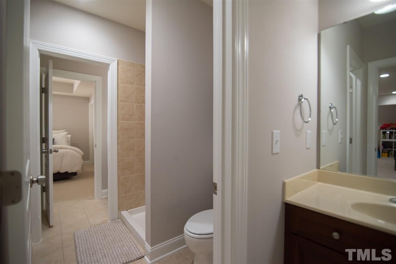 9311 Tabriz Point Raleigh, NC 27614 - Photo 21 of 25 Full basement bathroom for convenience and privacy.