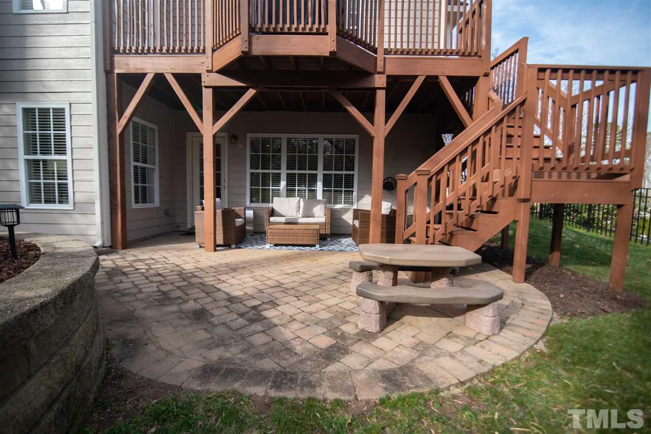9311 Tabriz Point Raleigh, NC 27614 - Photo 22 of 25 The brick paver patio is the ultimate place for outdoor living!