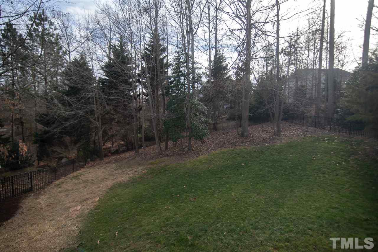 9311 Tabriz Point Raleigh, NC 27614 - Photo 24 of 25 The fully fenced back yard will let pets and children play while you have peace of mind!