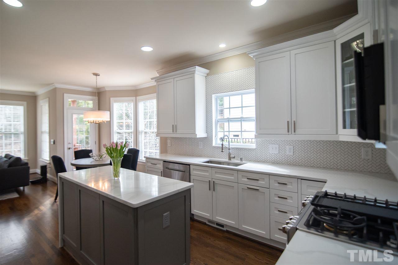 9311 Tabriz Point Raleigh, NC 27614 - Photo 4 of 25 Light and bright, this kitchen is the heart of the home.