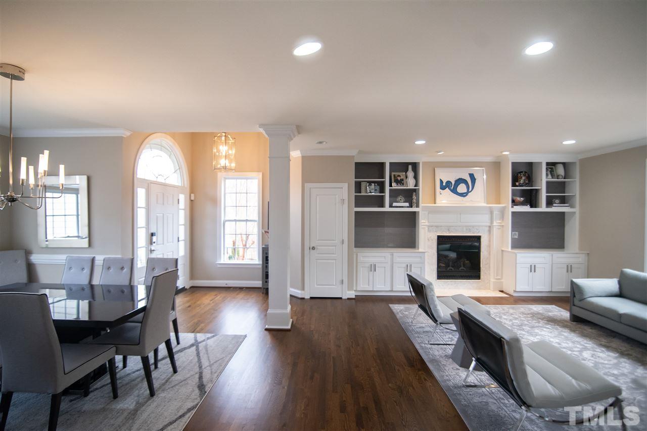 9311 Tabriz Point Raleigh, NC 27614 - Photo 9 of 25 WOW! This space is a knockout! Thoughtfully updated with brand new built-ins and tile surround on fireplace.