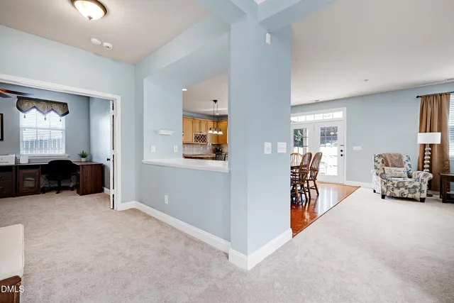 a workspace with furniture and window