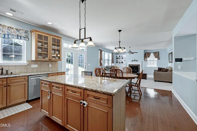 a bedroom with a bed and dresser