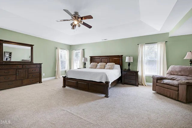 a bathroom with a sink double vanity and a mirror