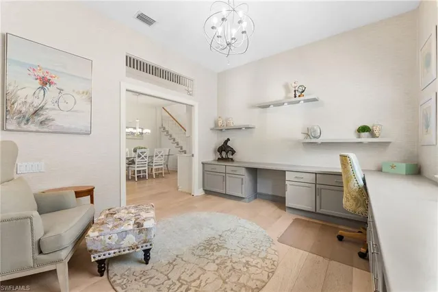 a bathroom with a granite countertop sink a toilet and a mirror