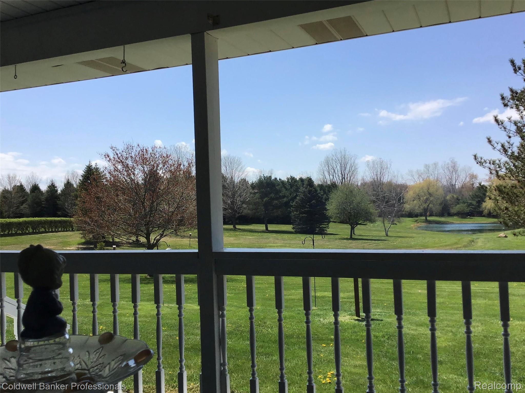 935 North Summers Road Imlay City, MI 48444 - Photo 14 of 73 Back deck view to pond.jpg
