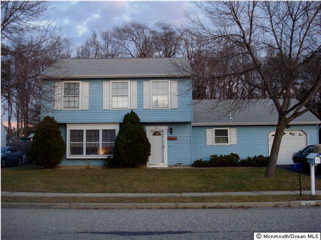 63 Reflection Road Toms River, NJ 08753 - Photo 1 of 3 front view of a house